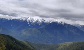 Snowclad Olympic Mountains as seen from Hurricane Ridge with low cloud cover